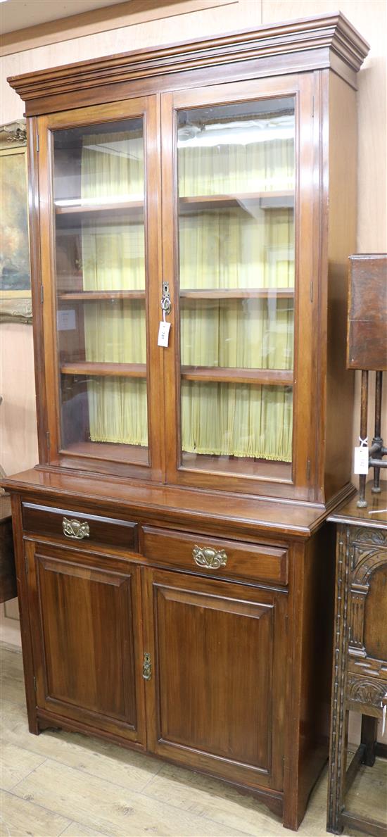 An Edwardian walnut bookcase W.108cm